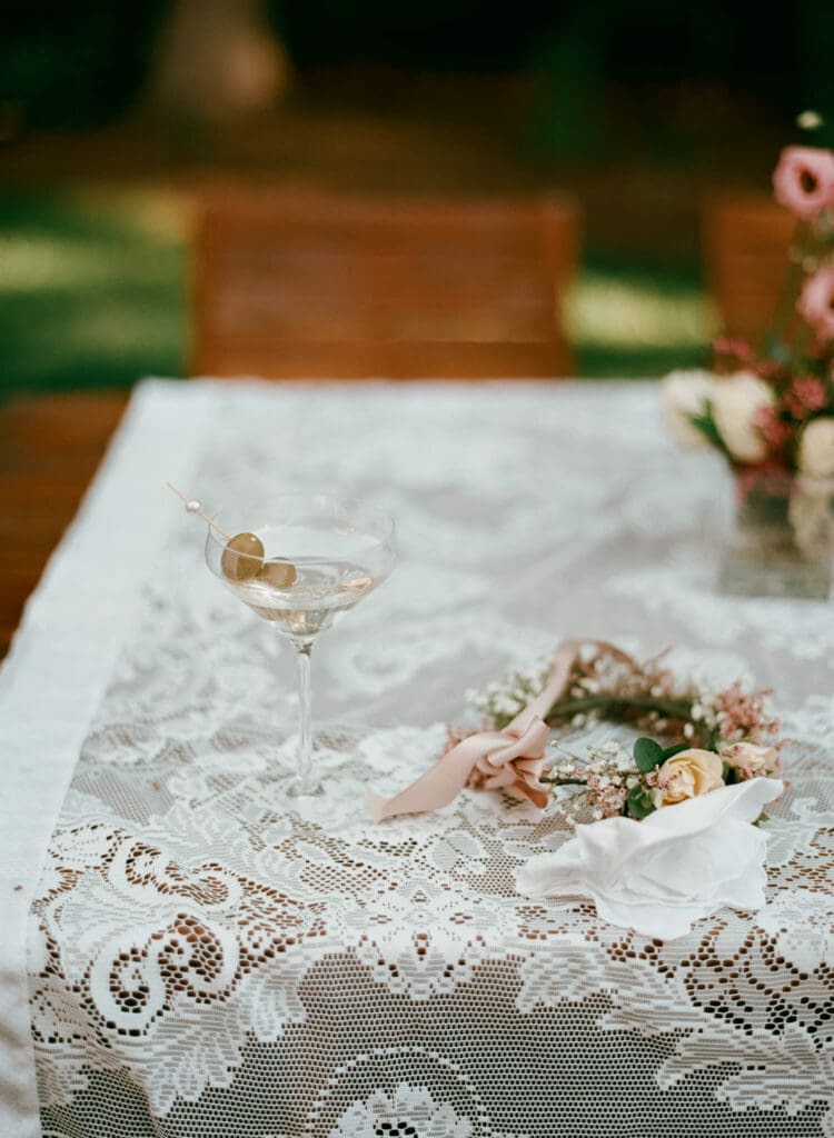 Floral-detailed place setting with gold flatware 